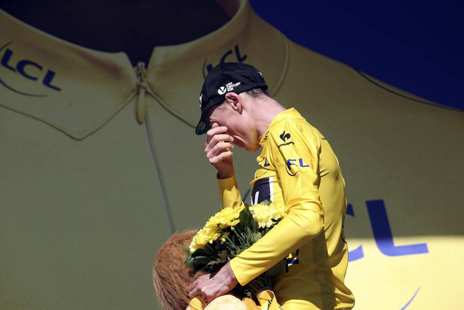 Le lacrime sul podio: il Tour  suo. Action Images